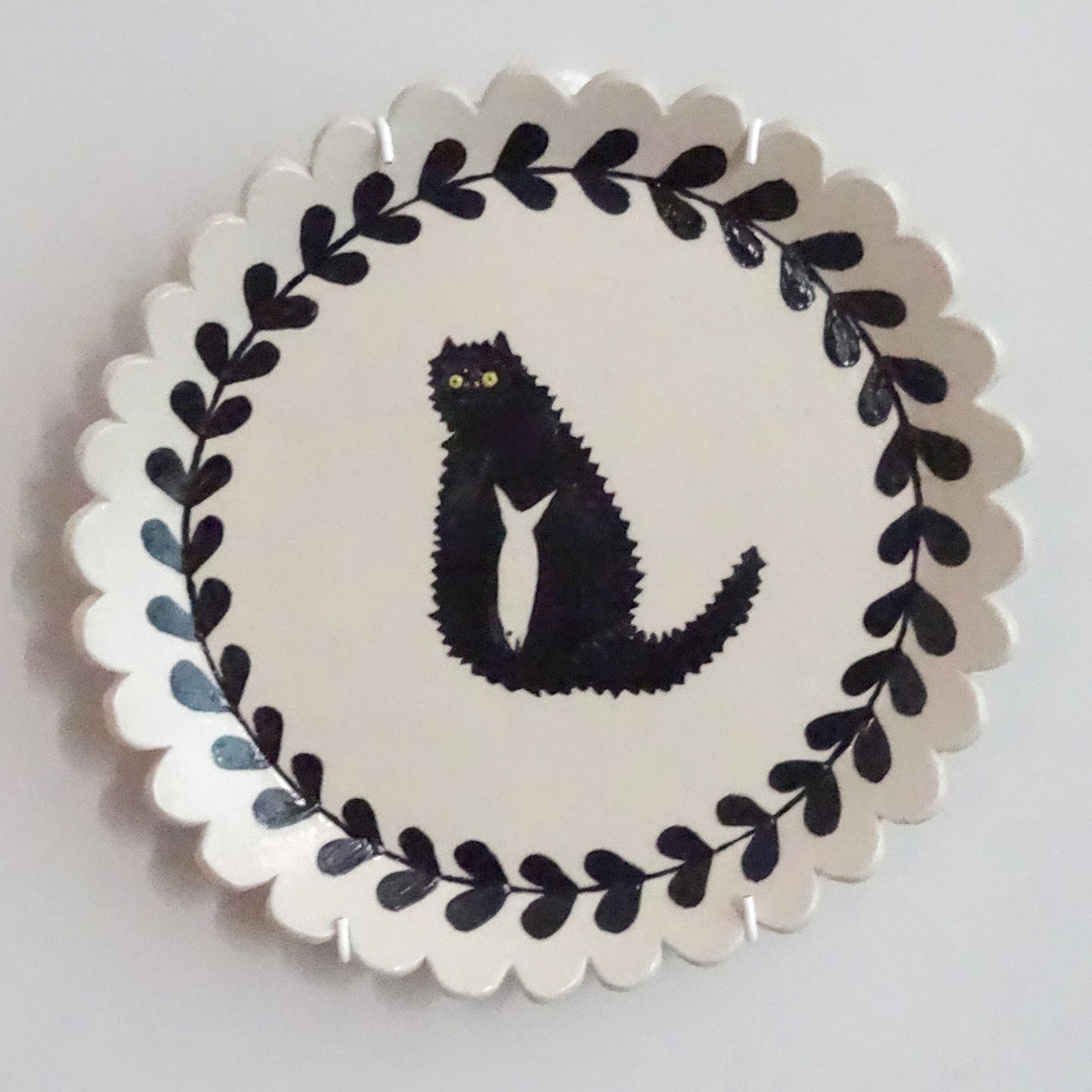 Handmade ceramic plate with hand-painted cat design